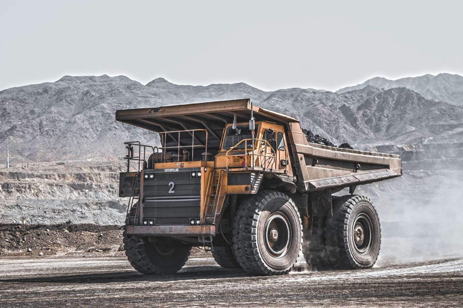 Massive Caterpillar dump truck in the mining site